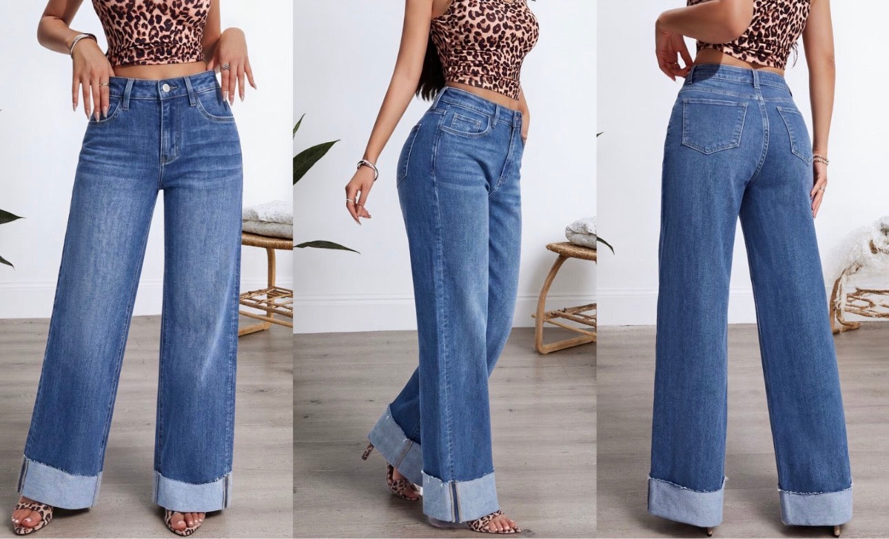 Three views of high-waist wide-leg cuffed jeans in medium blue wash paired with leopard print crop top