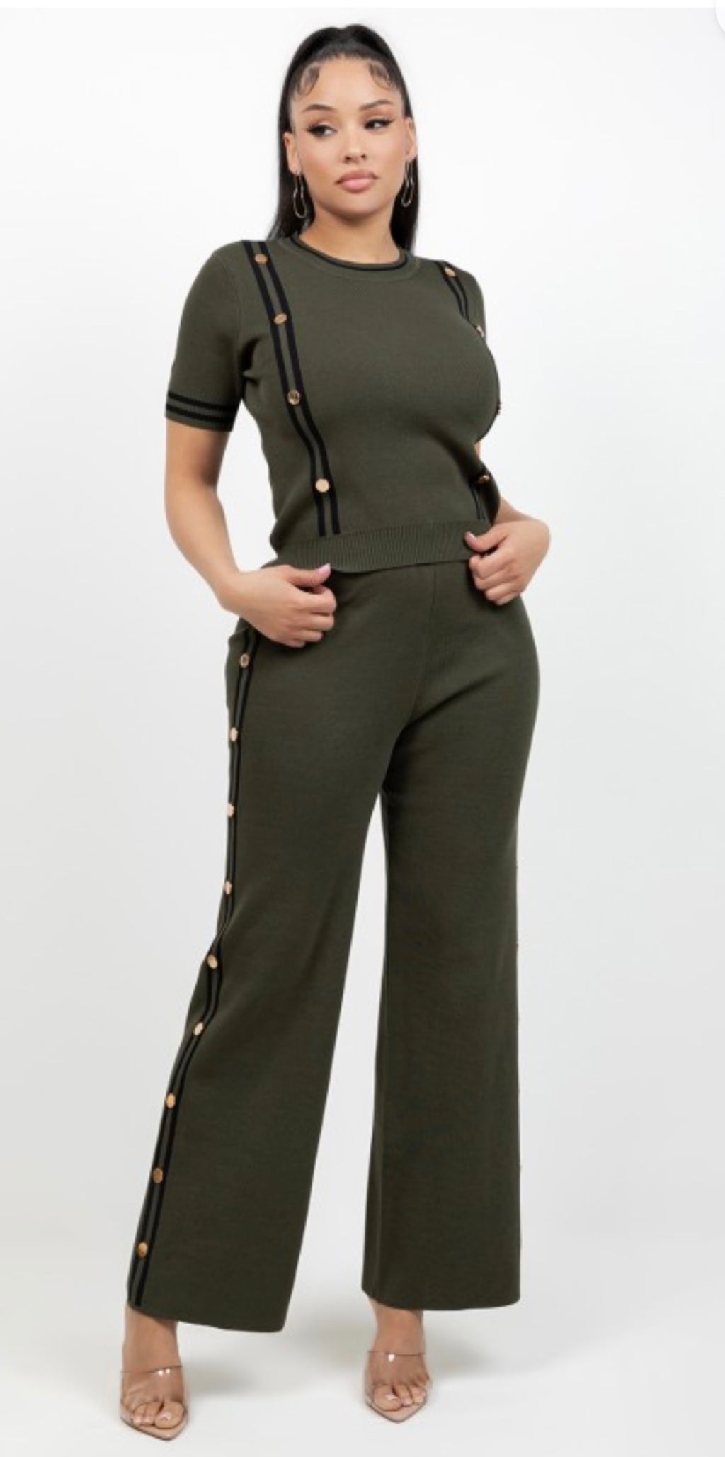 Woman wearing olive green two-piece set with button trim details