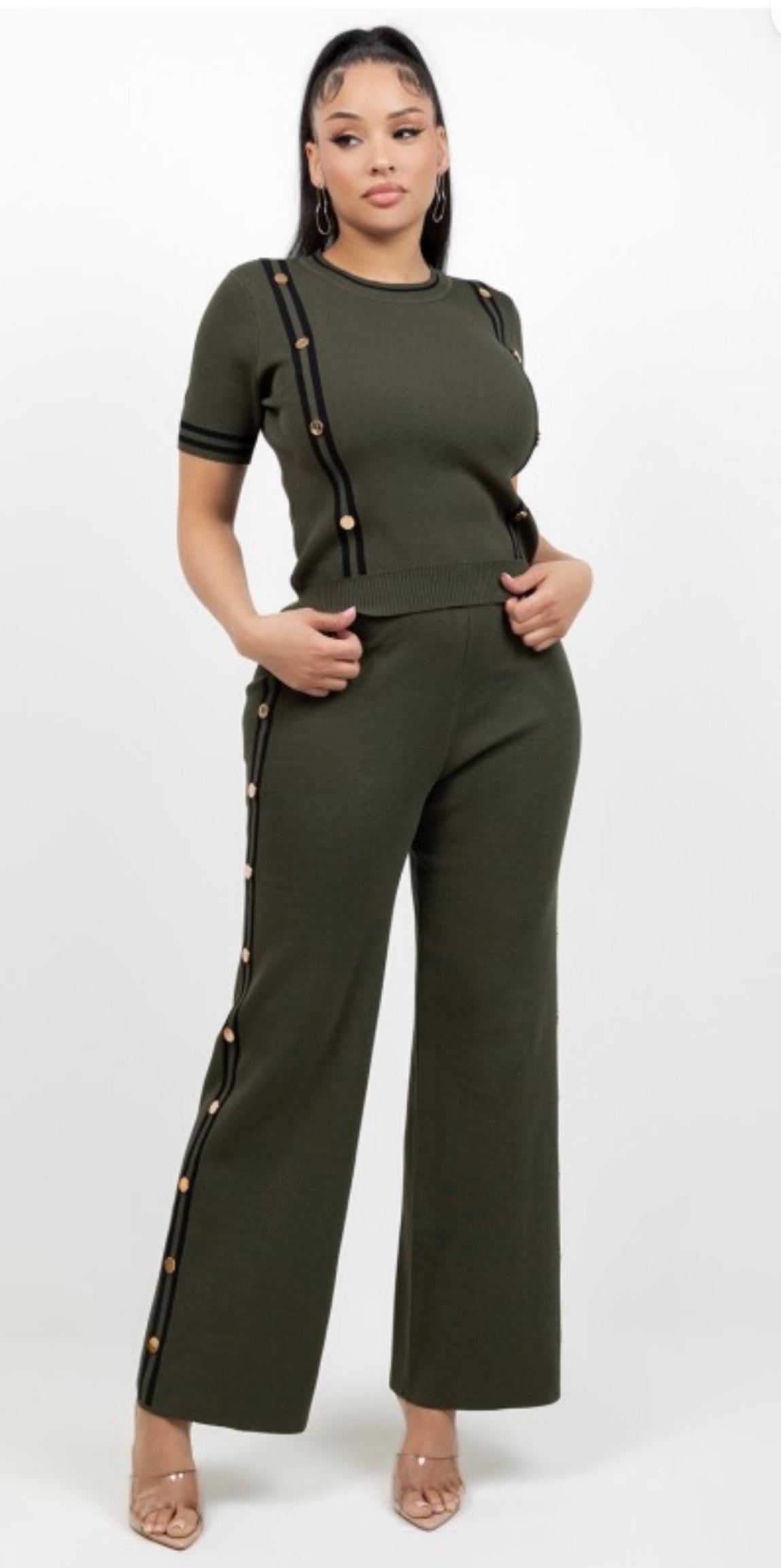 Woman wearing olive green two-piece set with button trim details